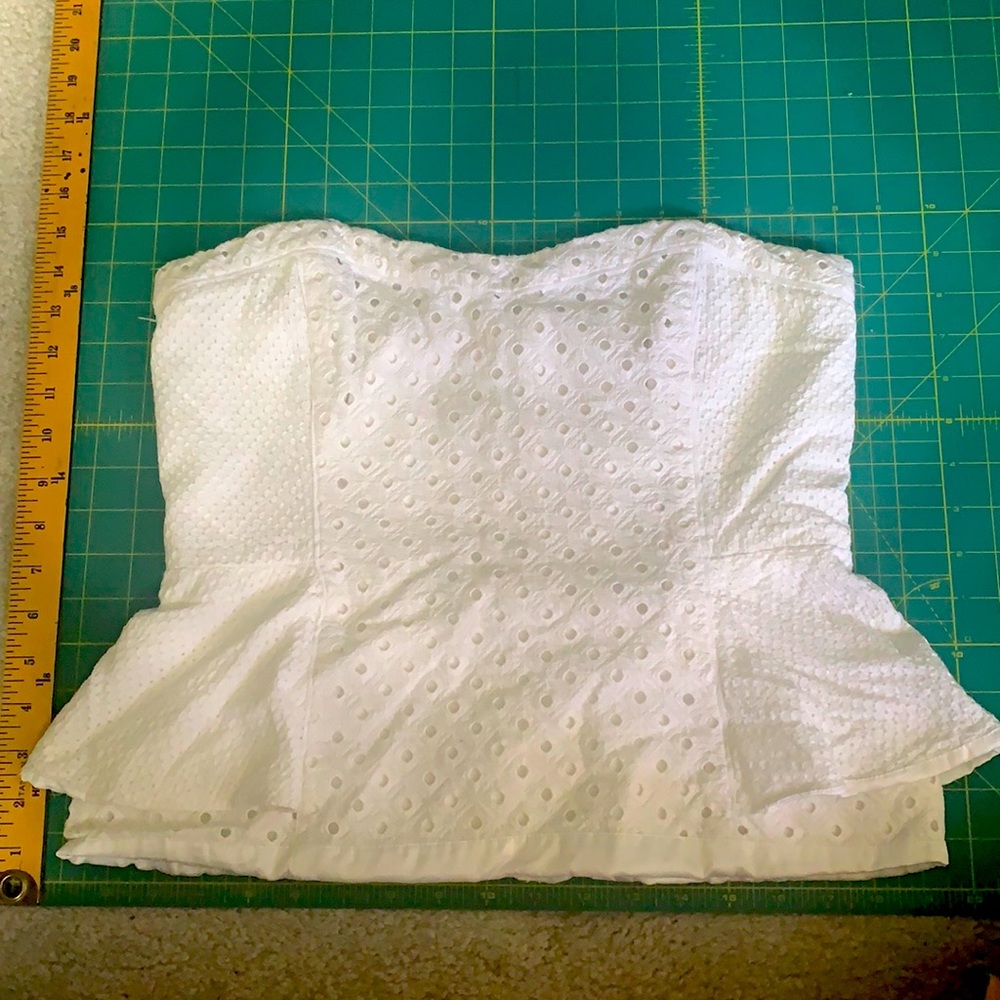 White House Black Market tube top. Cute eyelet style with boning on the inside.